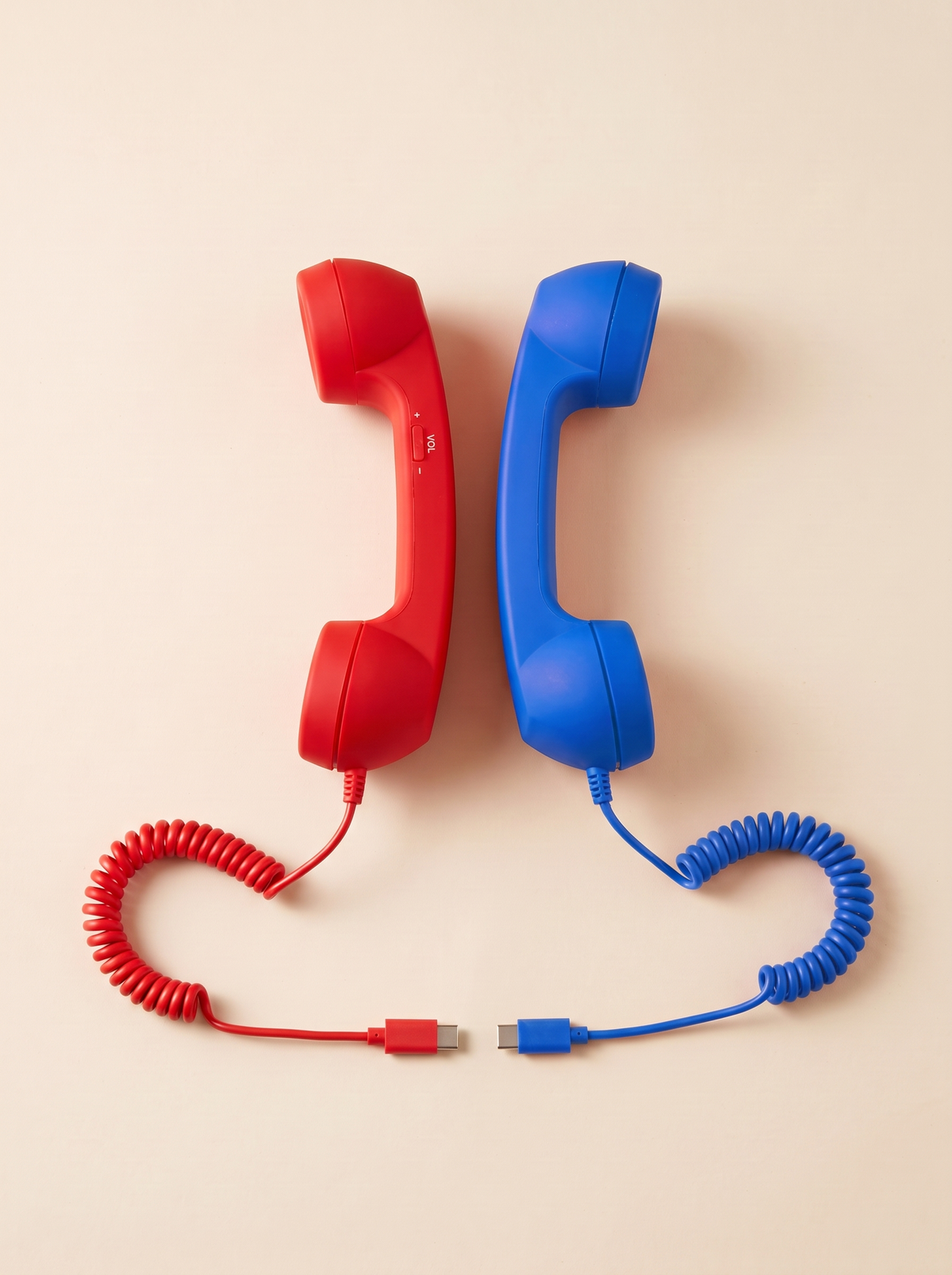 The Pair: two Talkie handsets side by side, Cherry and Long Distance blue.